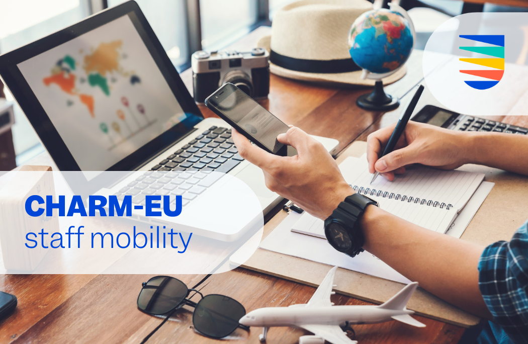 CHARM-EU staff mobility image with someone planning travel